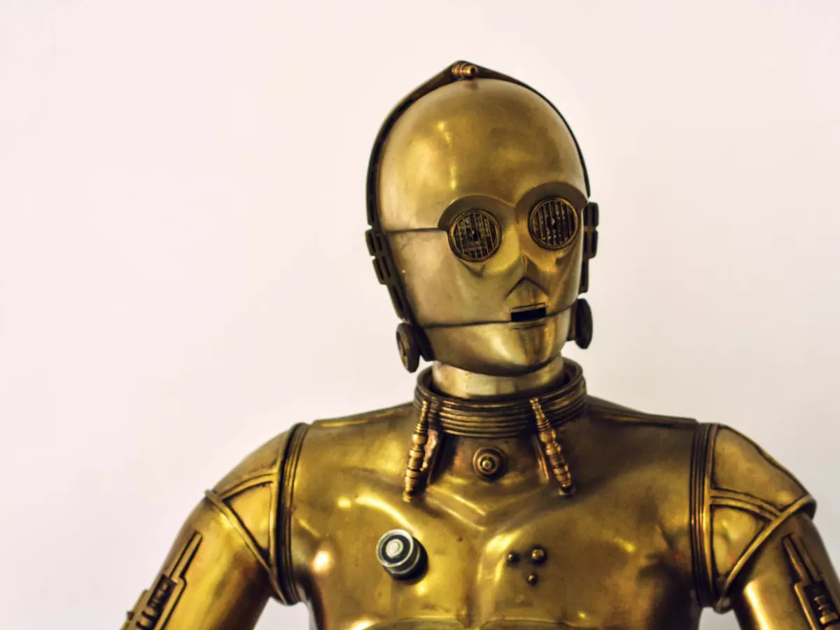 A close-up of C-3PO's head, showcasing his golden, humanoid features.