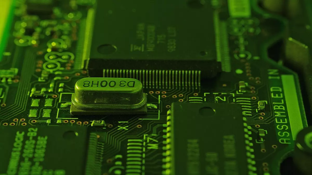 A close-up shot of a green circuit board with a focus on a chip labeled 